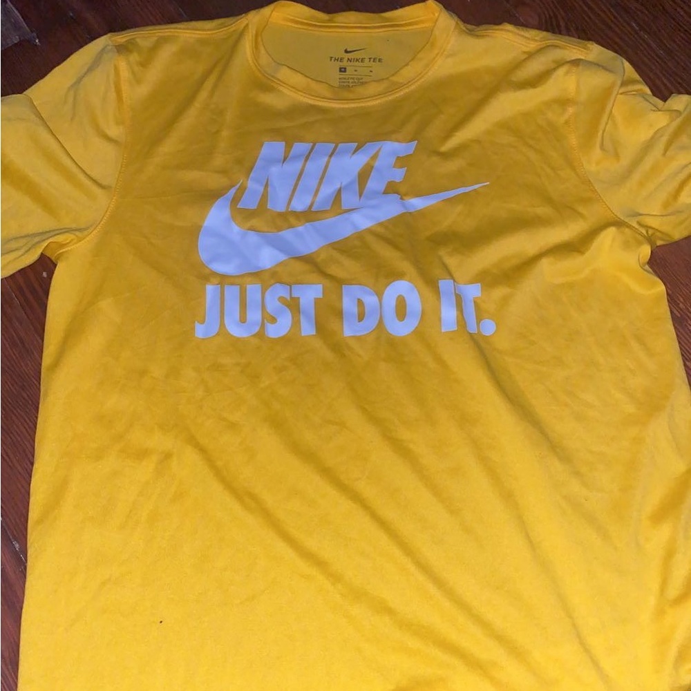 Yellow nike shirt, size medium